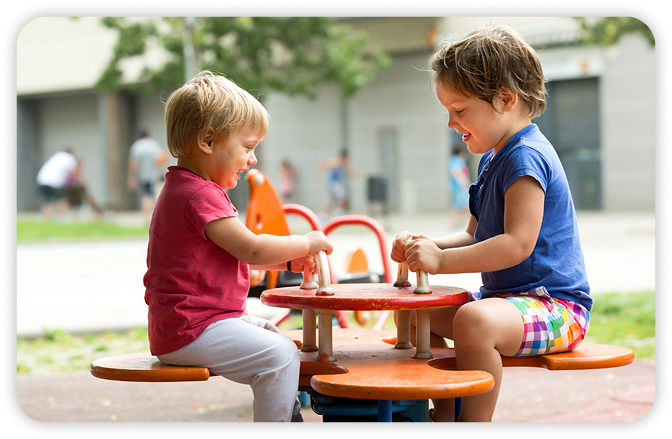 Teacher guiding children in a structured classroom setting